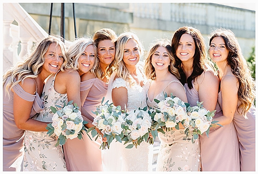 blush and ivory flowers, bridesmaids dresses with bridesmaids bouquets at Botleys Mansion wedding.