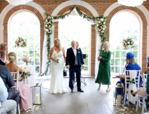 Great Fosters wedding ceremony flowers by recommended florist